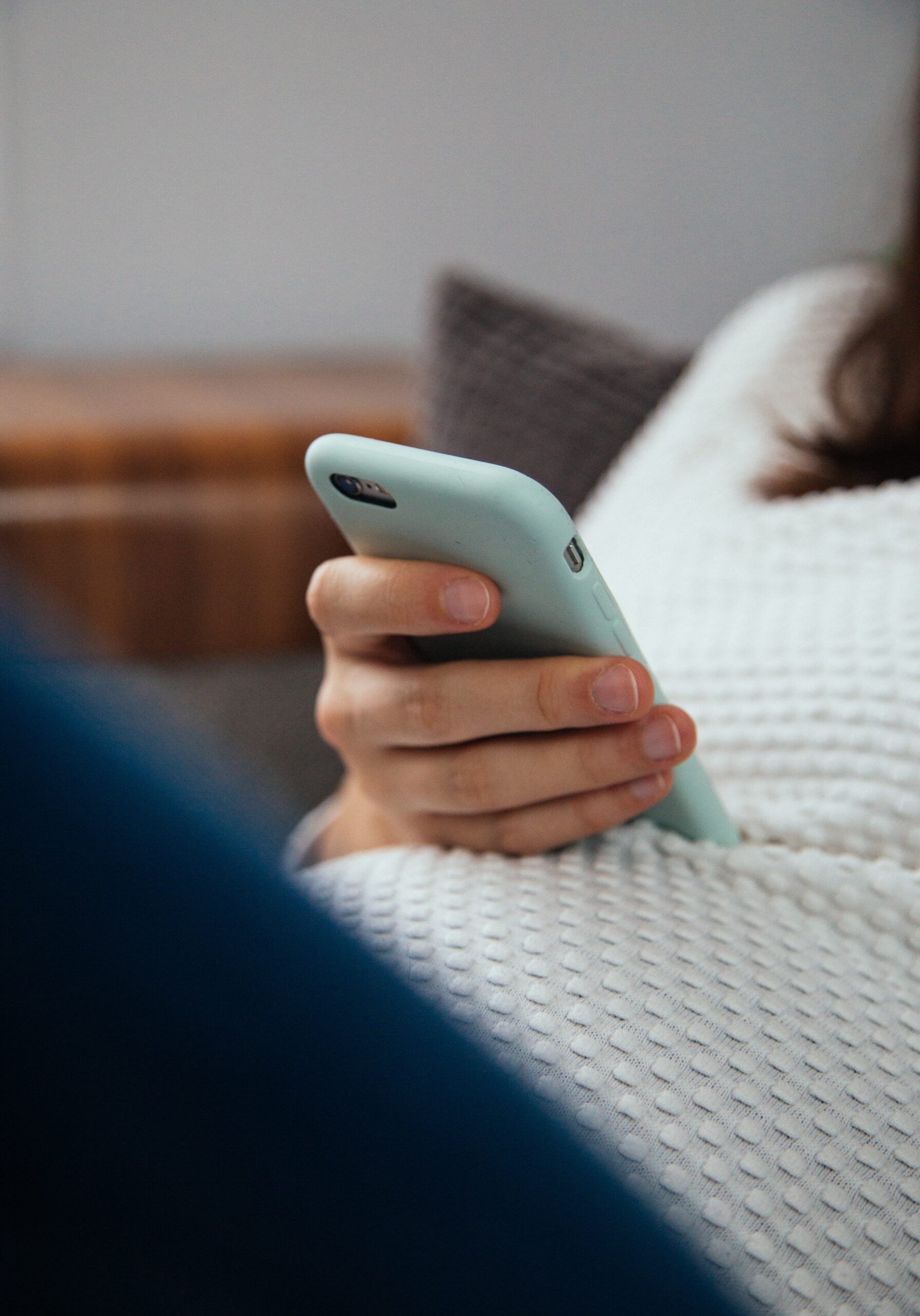 woman looking at phone