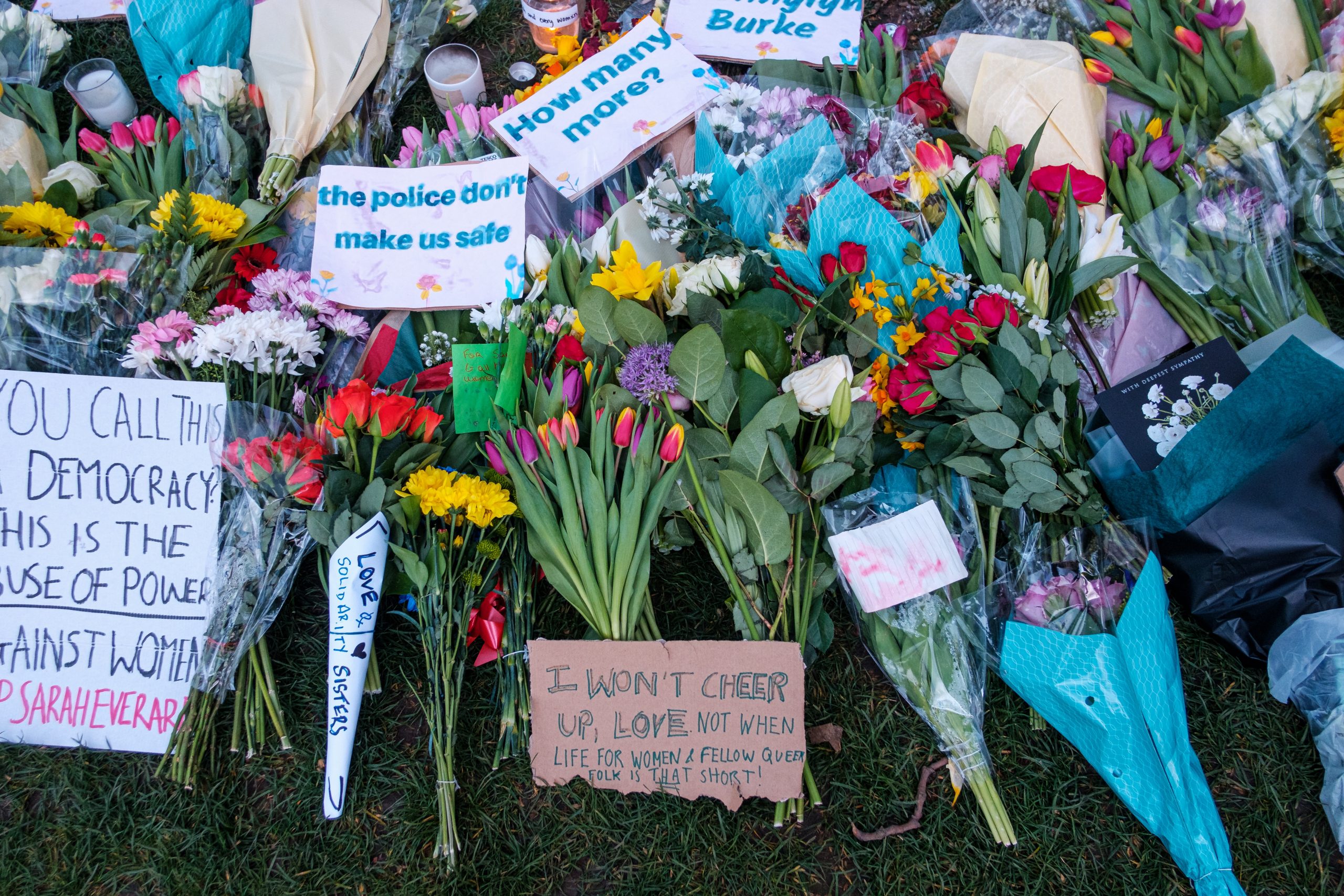 Flowers and placards against violence against women